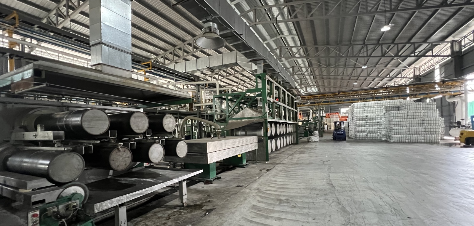 Production hall at the Jimzheng plant with fiber lines and baled staple fiber